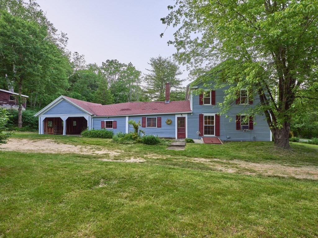 194 Wales Road Brimfield, MA 01010 - Photo 3 of 42 a view of a yard in front of a house