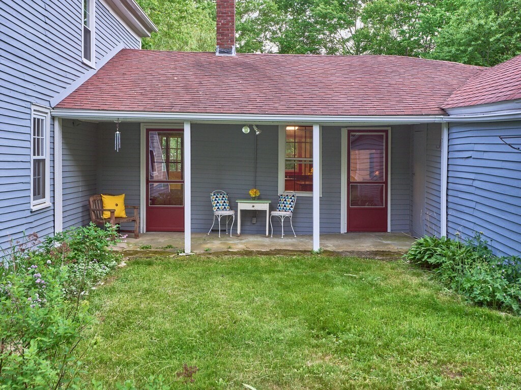 194 Wales Road Brimfield, MA 01010 - Photo 4 of 42 a view of a house with a patio