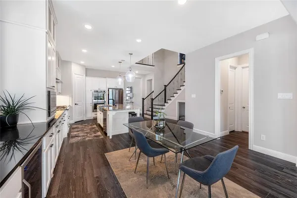 a view of a living room and dining room