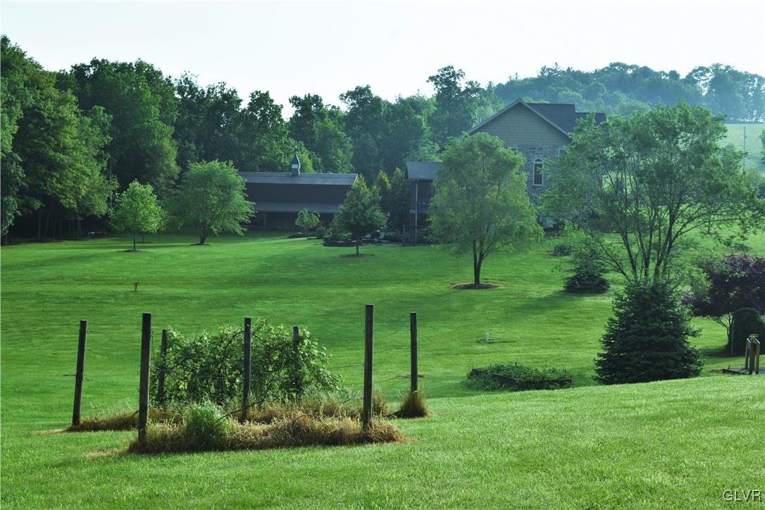 1983 Snyder Road Ulster, PA 18850 - Photo 12 of 50 a view of a garden with a fountain