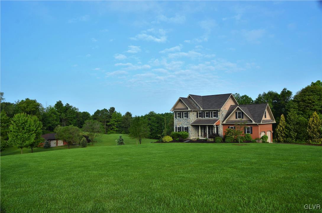 1983 Snyder Road Ulster, PA 18850 - Photo 2 of 50 a front view of house with yard and green space