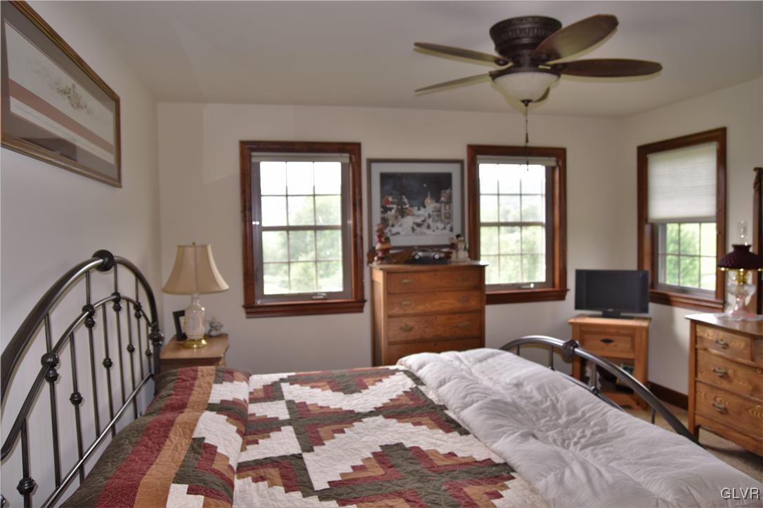 1983 Snyder Road Ulster, PA 18850 - Photo 30 of 50 a bedroom with a bed and a window