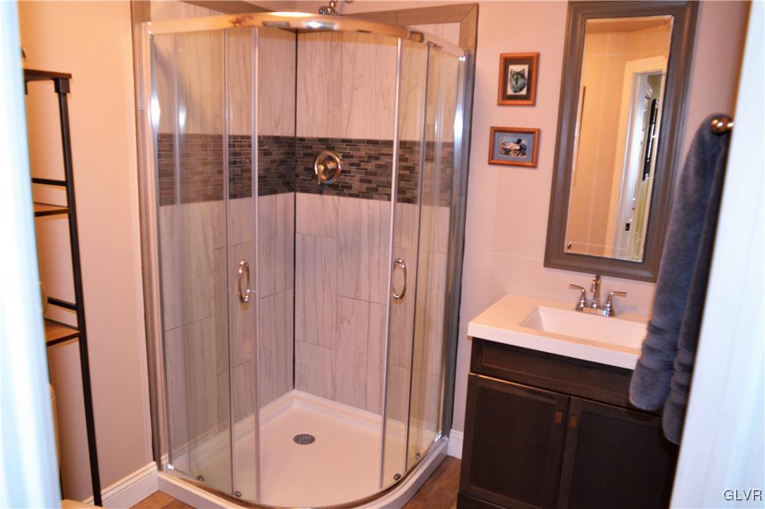 1983 Snyder Road Ulster, PA 18850 - Photo 38 of 50 a bathroom with a sink and a mirror
