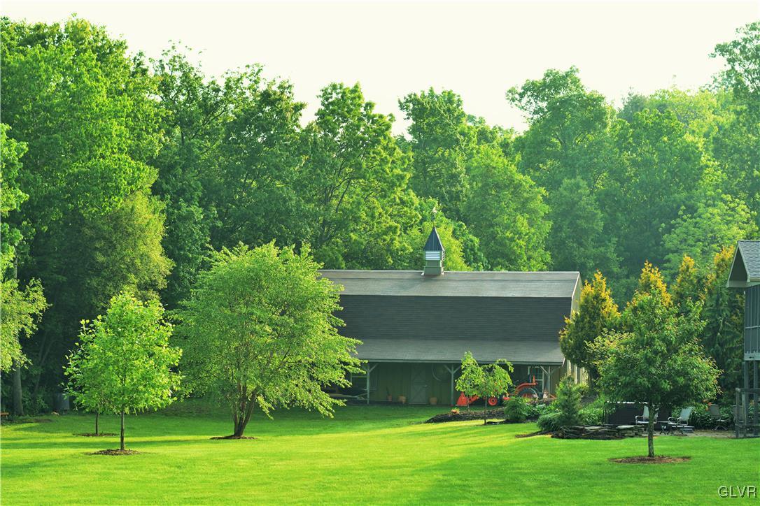 1983 Snyder Road Ulster, PA 18850 - Photo 46 of 50 front view of a house with a yard