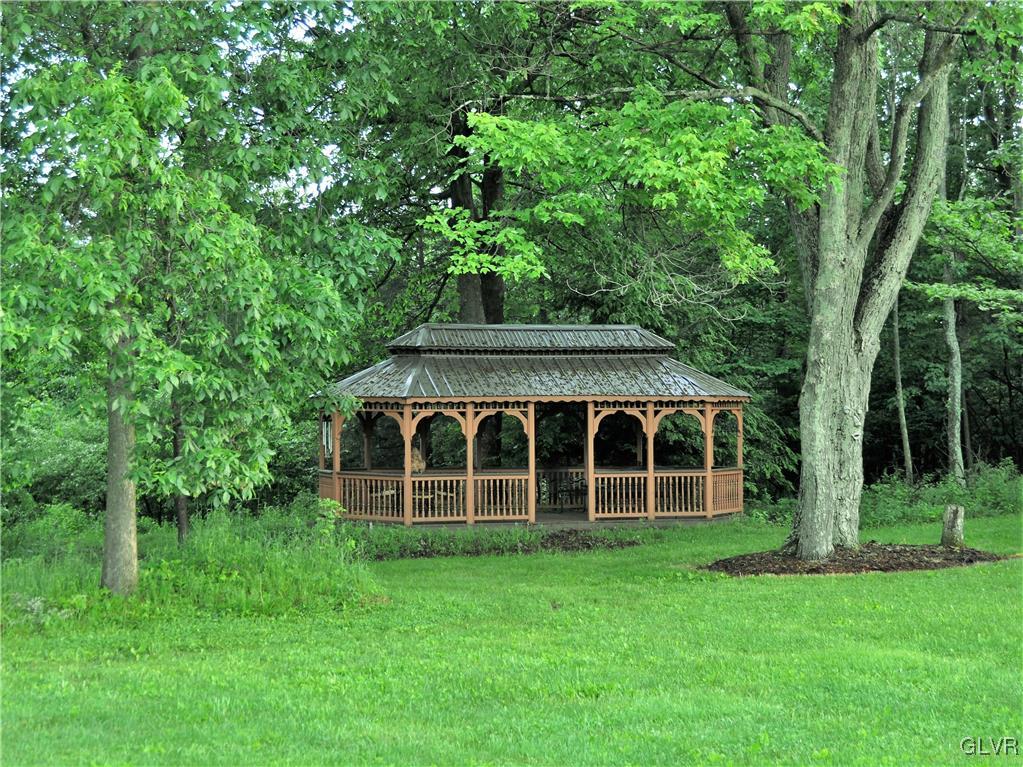 1983 Snyder Road Ulster, PA 18850 - Photo 8 of 50 front view of a house with a garden