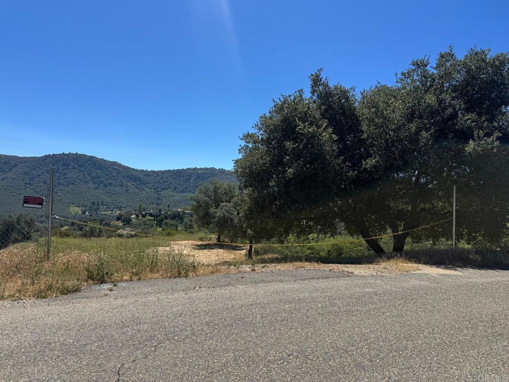 15543 Mathew Road Valley Center, CA 92082 - Photo 2 of 4 a view of lake with mountain