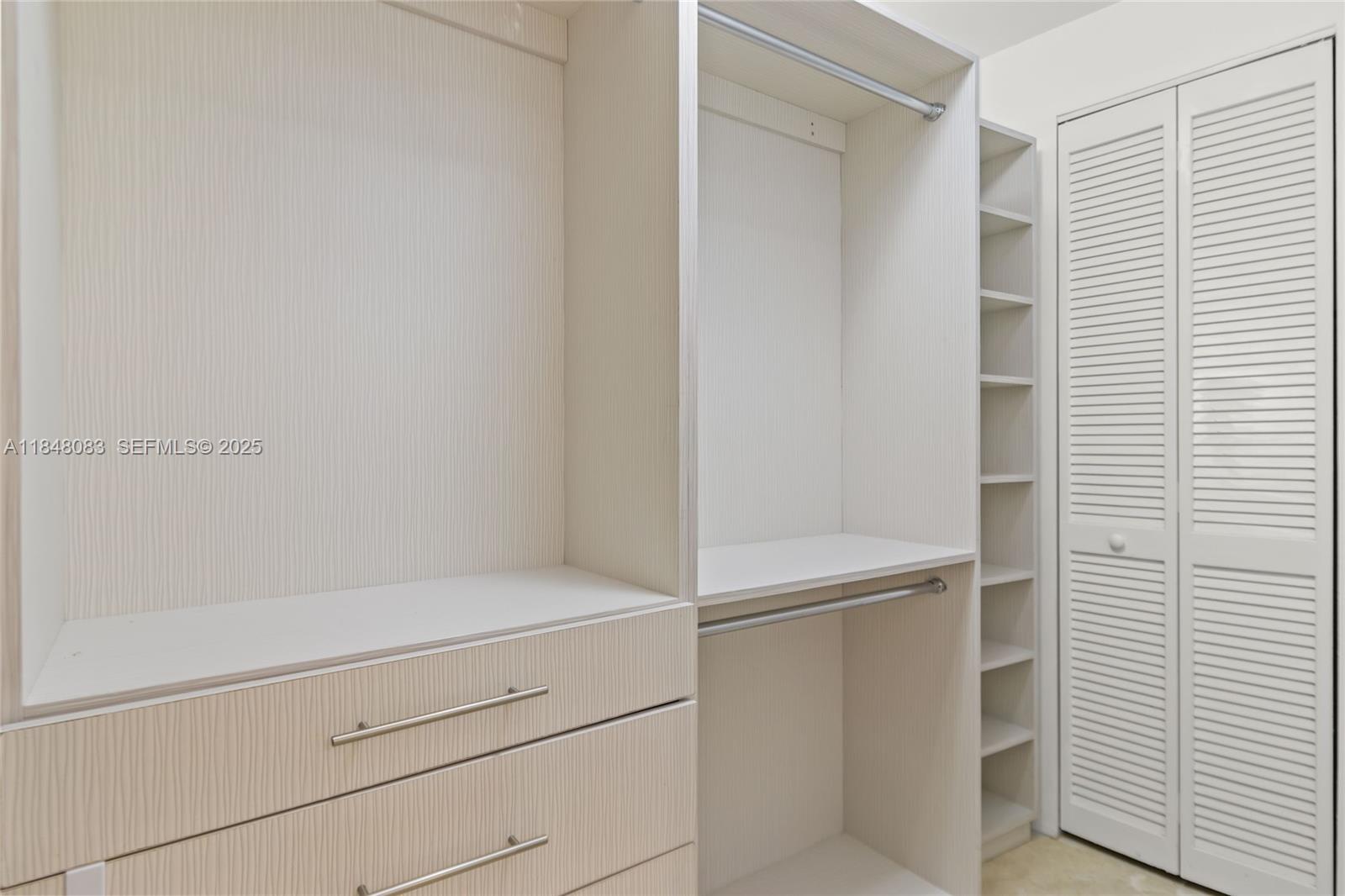 703 Crandon Boulevard, Unit PH3 Key Biscayne, FL 33149 - Photo 17 of 40 a close view of closet and utility room