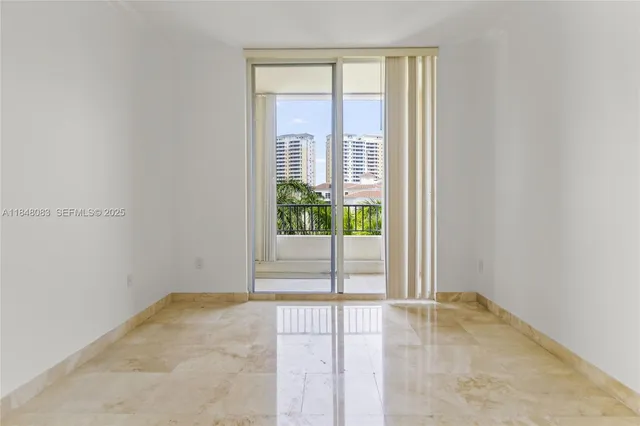 a view of a room with a large window