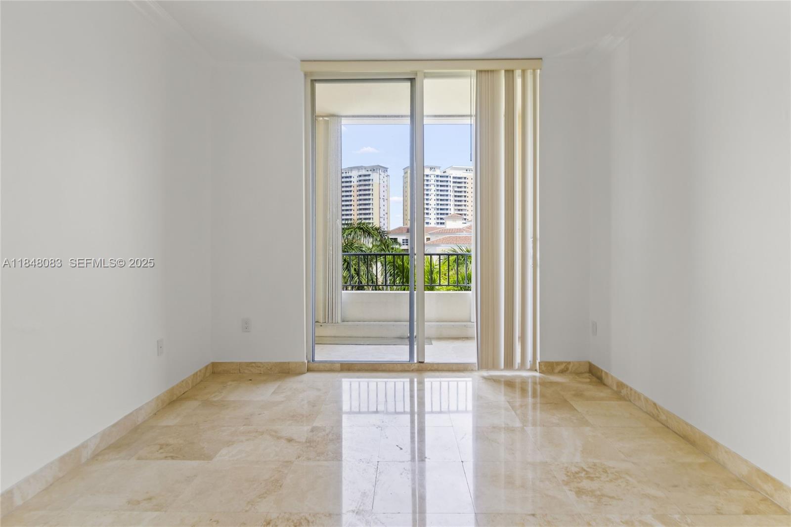 703 Crandon Boulevard, Unit PH3 Key Biscayne, FL 33149 - Photo 30 of 40 a view of a room with a large window