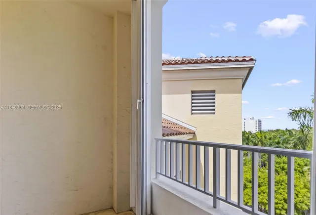 a view of a balcony with an outdoor space