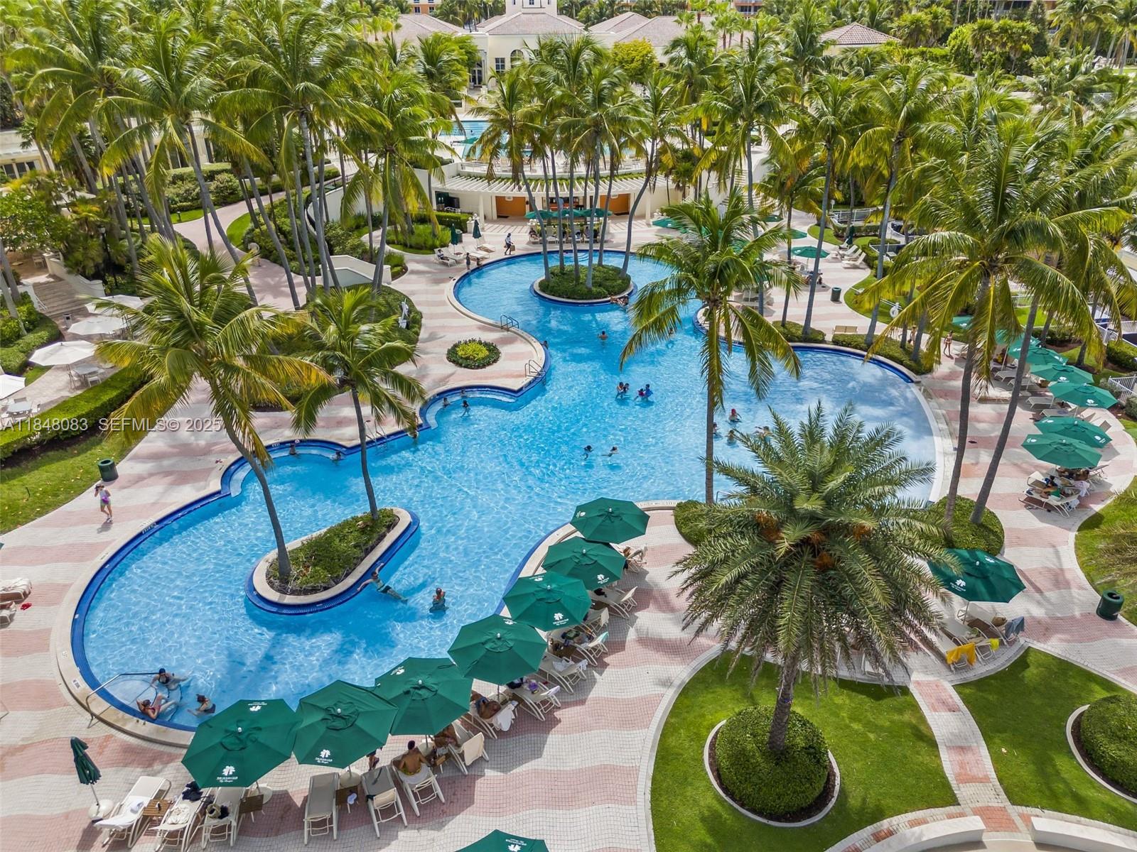 703 Crandon Boulevard, Unit PH3 Key Biscayne, FL 33149 - Photo 4 of 40 a view of outdoor space and yard