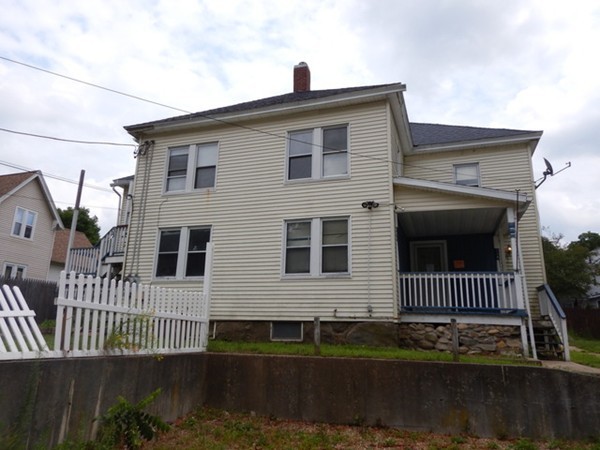 31-33 Aspen Street Ware, MA 01082 - Photo 1 of 31 a front view of a house with a yard
