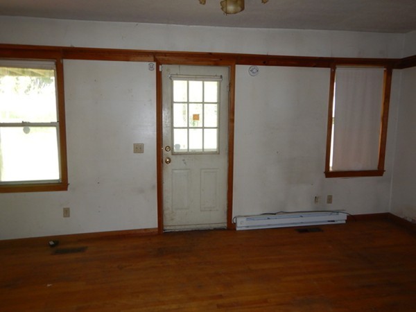 31-33 Aspen Street Ware, MA 01082 - Photo 14 of 31 an empty room with wooden floor and windows