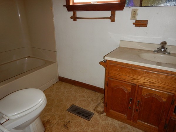 31-33 Aspen Street Ware, MA 01082 - Photo 15 of 31 a bathroom with a sink and a toilet