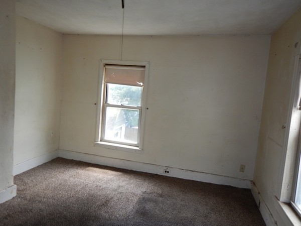 31-33 Aspen Street Ware, MA 01082 - Photo 18 of 31 an empty room with a window