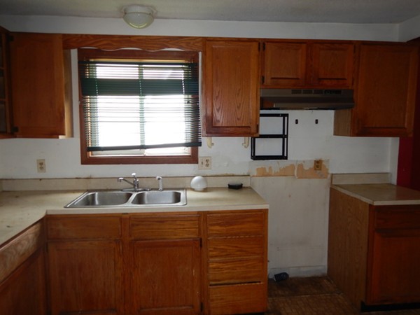 31-33 Aspen Street Ware, MA 01082 - Photo 27 of 31 a kitchen with a sink and a cabinets