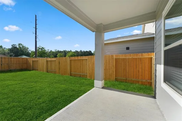 a view of a backyard with plants