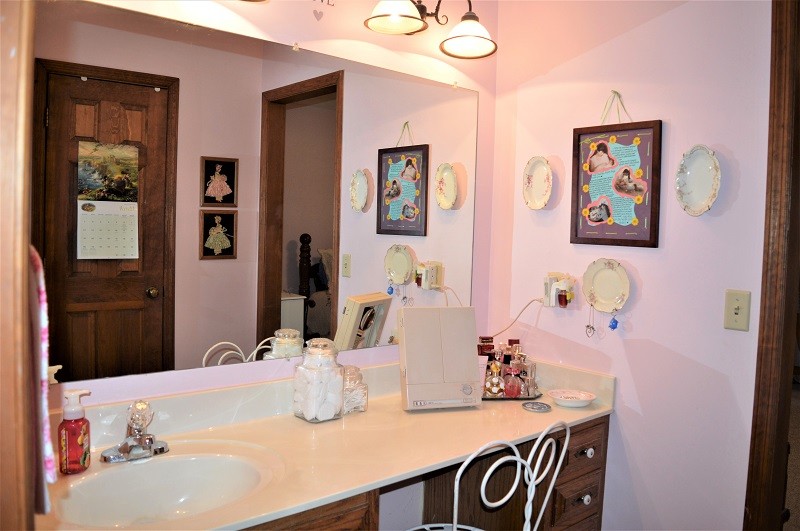 505 W Road Morrison, TN 37357 - Photo 24 of 44 a bathroom with a sink and a mirror