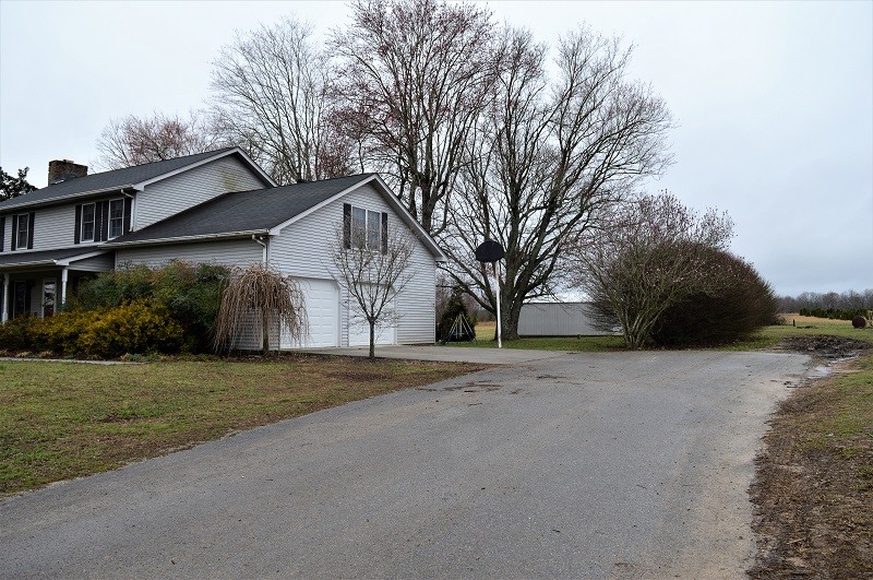 505 W Road Morrison, TN 37357 - Photo 31 of 44 a view of a house with a yard
