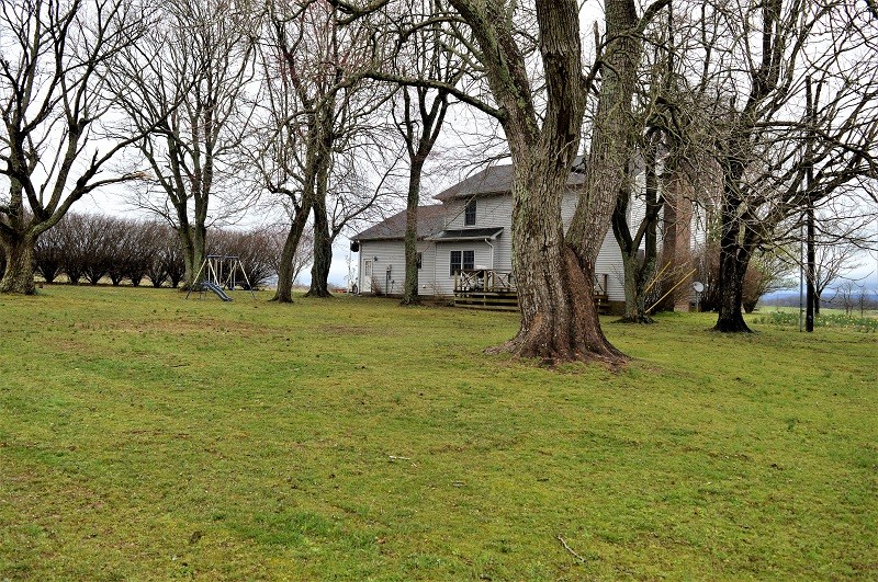 505 W Road Morrison, TN 37357 - Photo 34 of 44 a view of a house with a yard