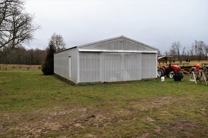 505 W Road Morrison, TN 37357 - Photo 42 of 44 a fire hydrant in the middle of a field