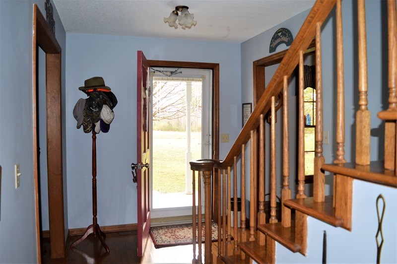 505 W Road Morrison, TN 37357 - Photo 6 of 44 a view of an entryway with wooden floor and stairs