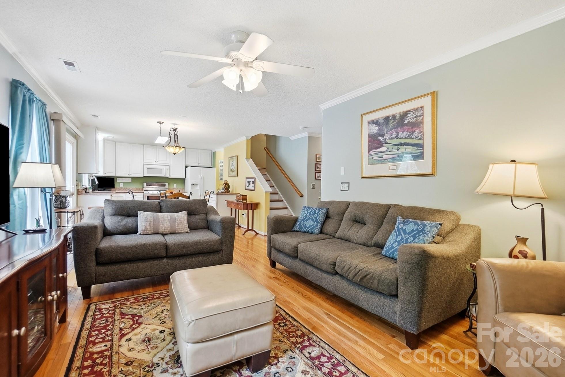 442 Sugar Maple Drive Tega Cay, SC 29708 - Photo 6 of 48 a living room with furniture and a view of kitchen