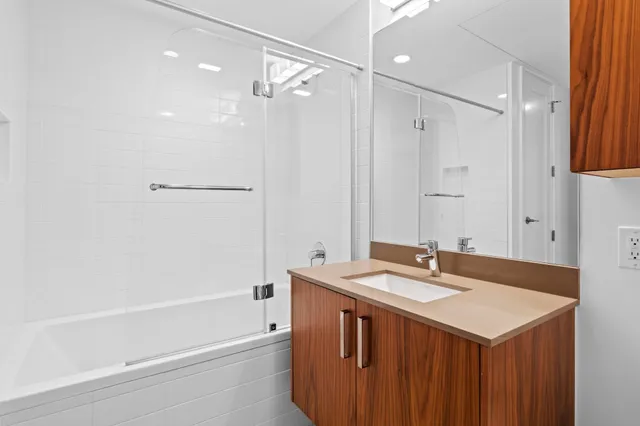 a view of a hallway with washer and dryer