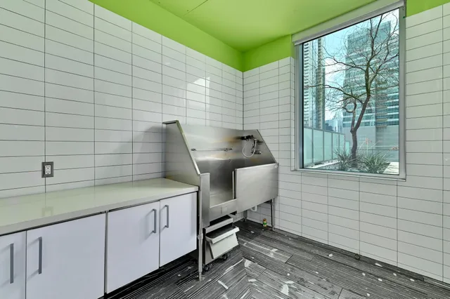 a lobby with furniture and rug