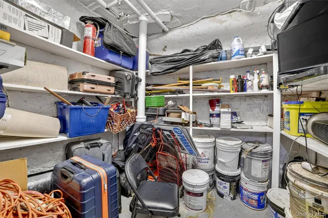 a view of a hallway with a chandelier