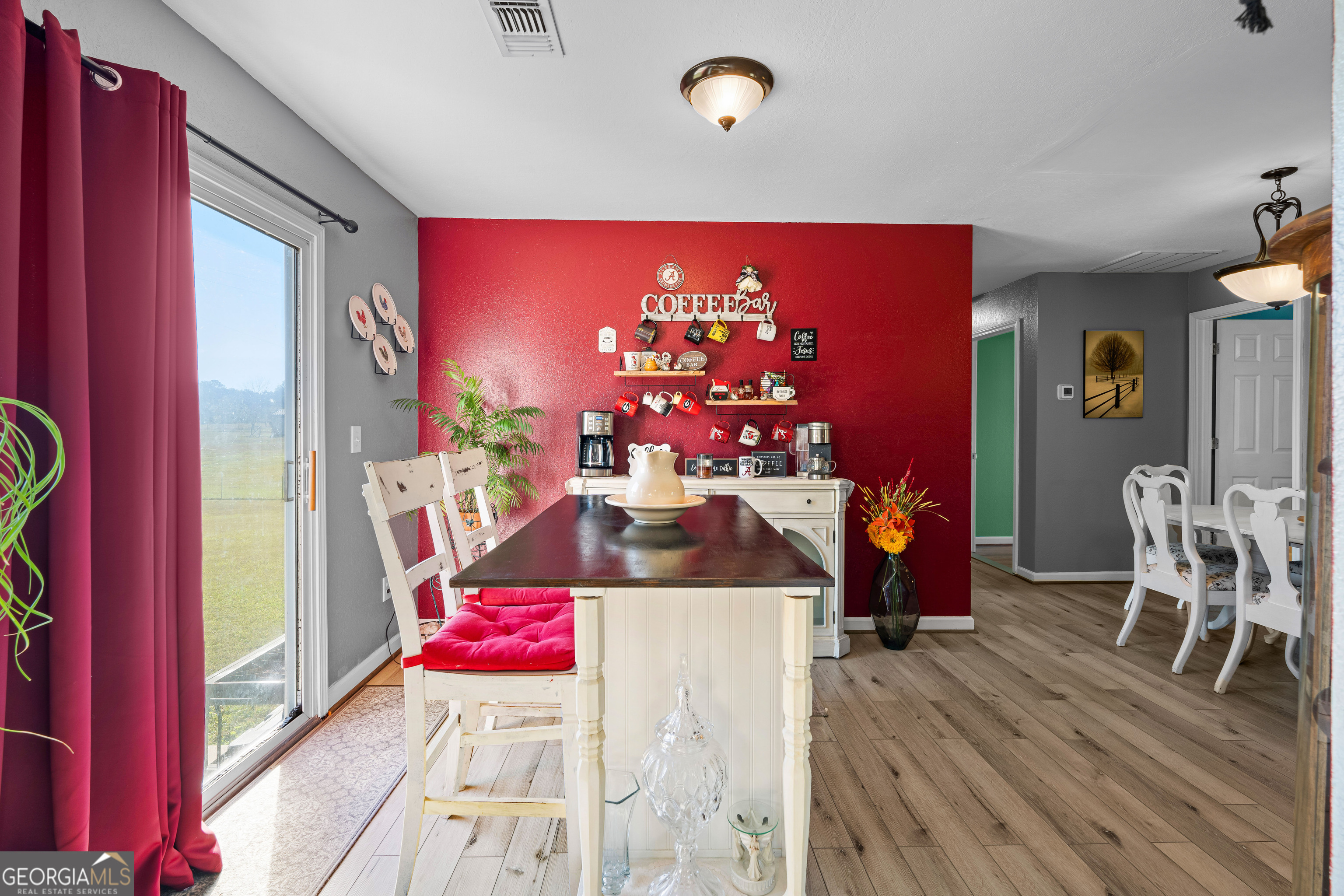 3939 Bevis Road Franklin, GA 30217 - Photo 13 of 40 a living room with furniture and wooden floor