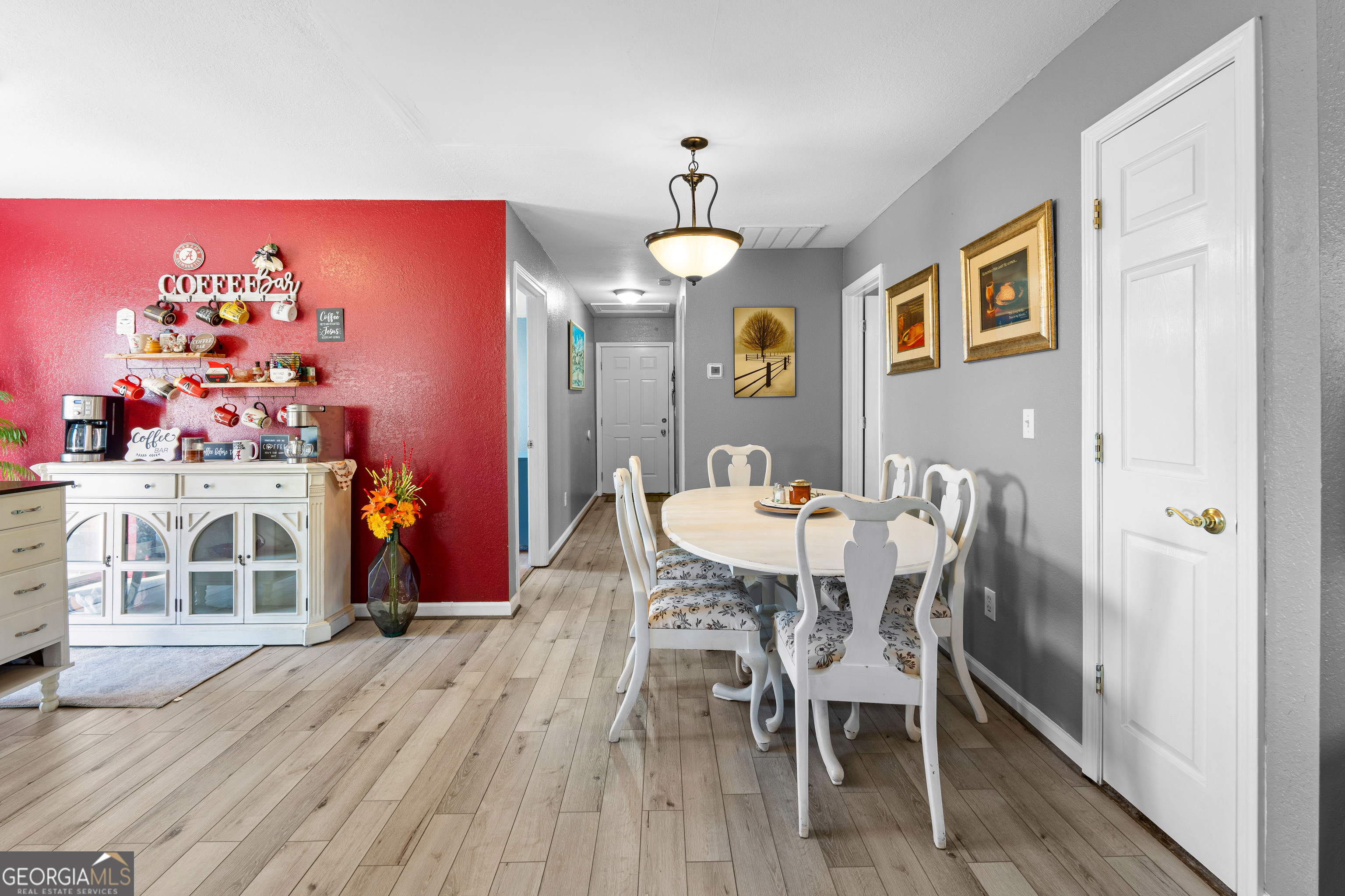 3939 Bevis Road Franklin, GA 30217 - Photo 20 of 40 a view of a dining room with furniture and wooden floor