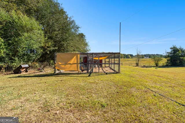 a view of a swimming pool with an outdoor space