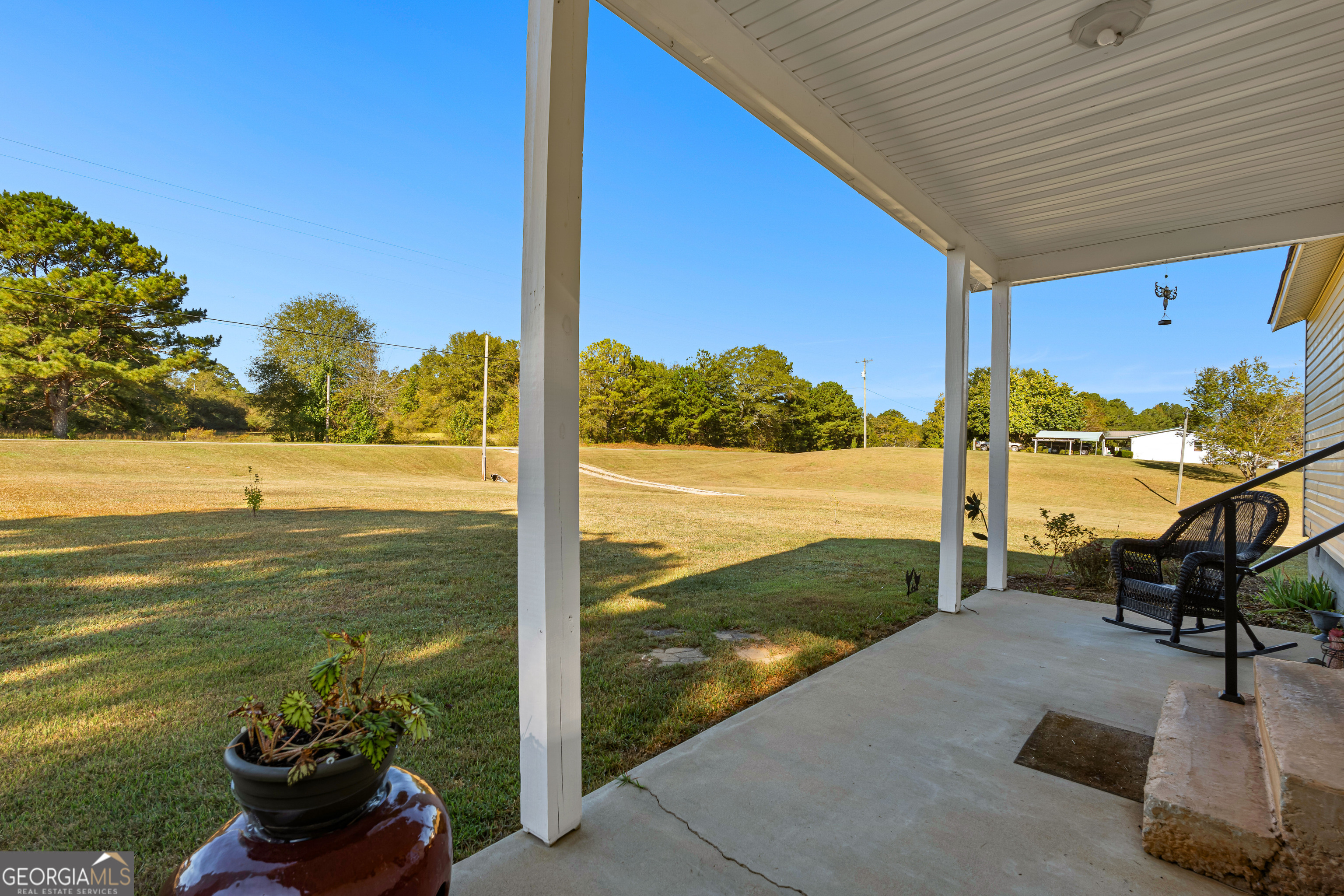 3939 Bevis Road Franklin, GA 30217 - Photo 6 of 40 a view of a terrace with yard