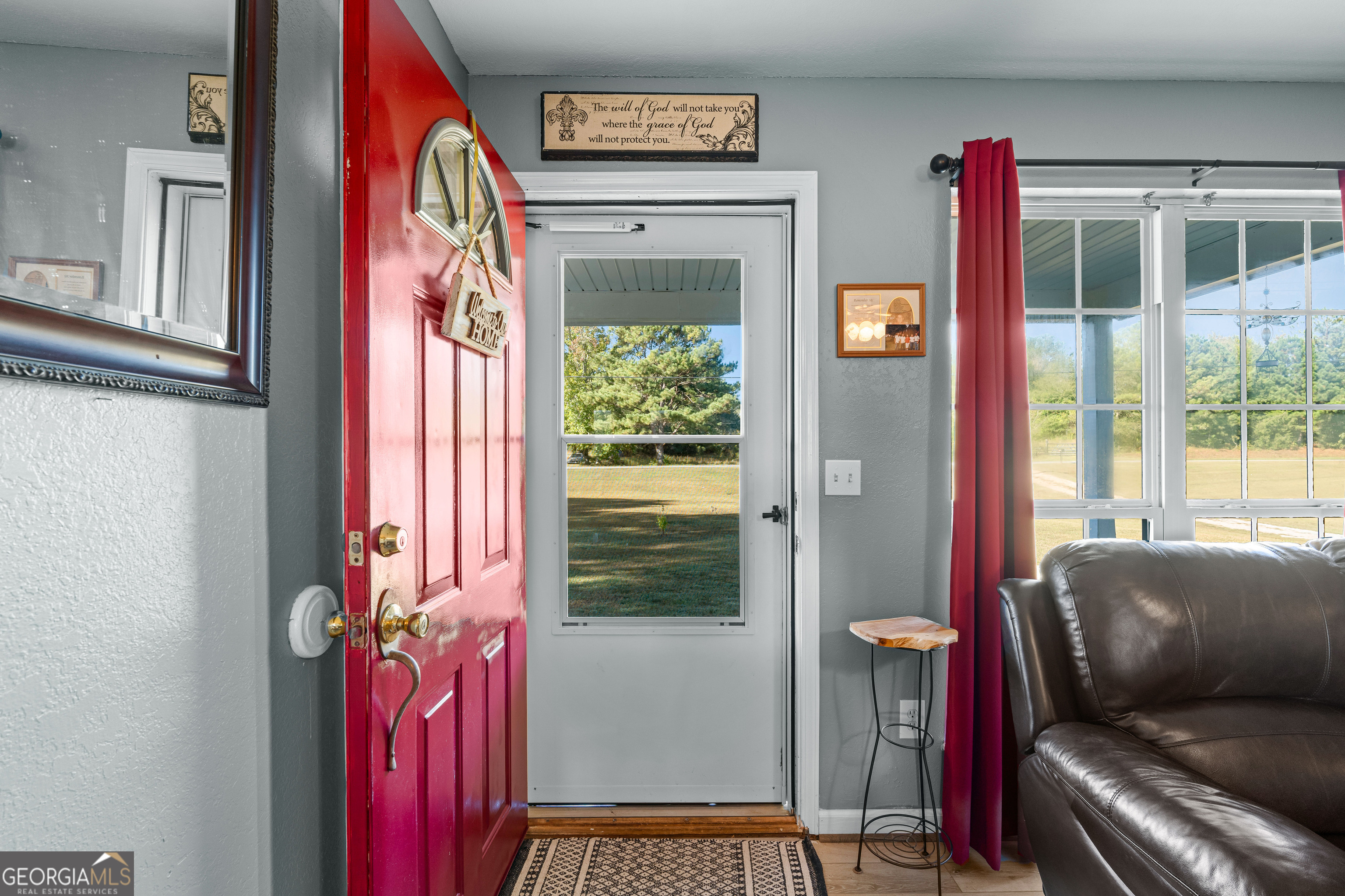 3939 Bevis Road Franklin, GA 30217 - Photo 8 of 40 a living room with furniture and a window