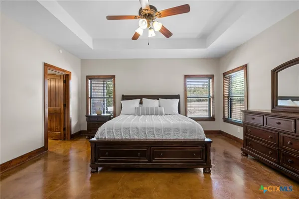 a spacious bathroom with a sink double vanity and a mirror