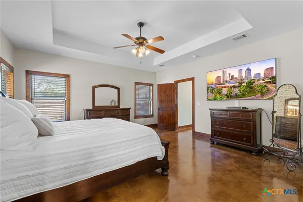 a white bath tub sitting next to a window