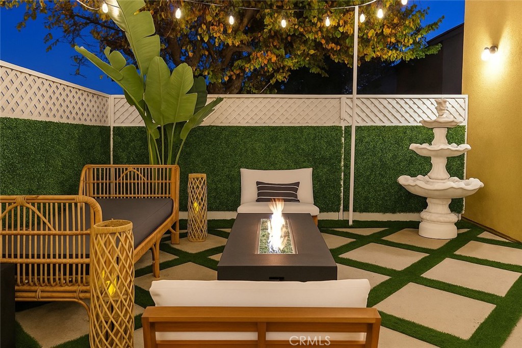 16706 Tim Lane Van Nuys, CA 91406 - Photo 14 of 16 a view of a chairs and table in the patio