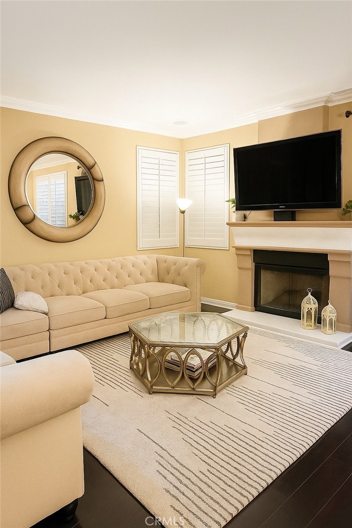 16706 Tim Lane Van Nuys, CA 91406 - Photo 3 of 16 a living room with furniture and a flat screen tv