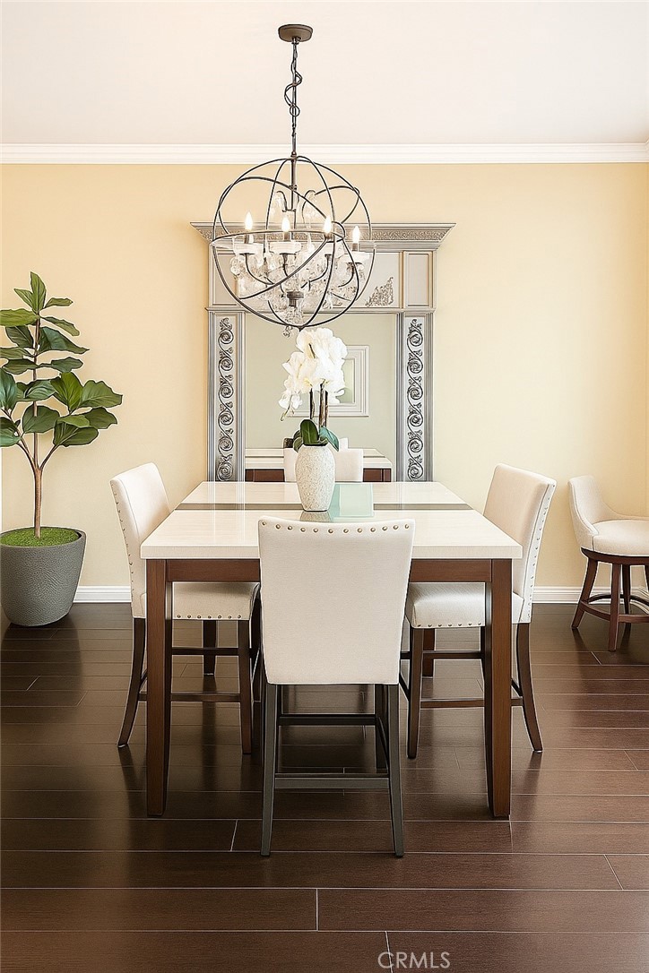16706 Tim Lane Van Nuys, CA 91406 - Photo 5 of 16 a view of a dining room with furniture window and wooden floor