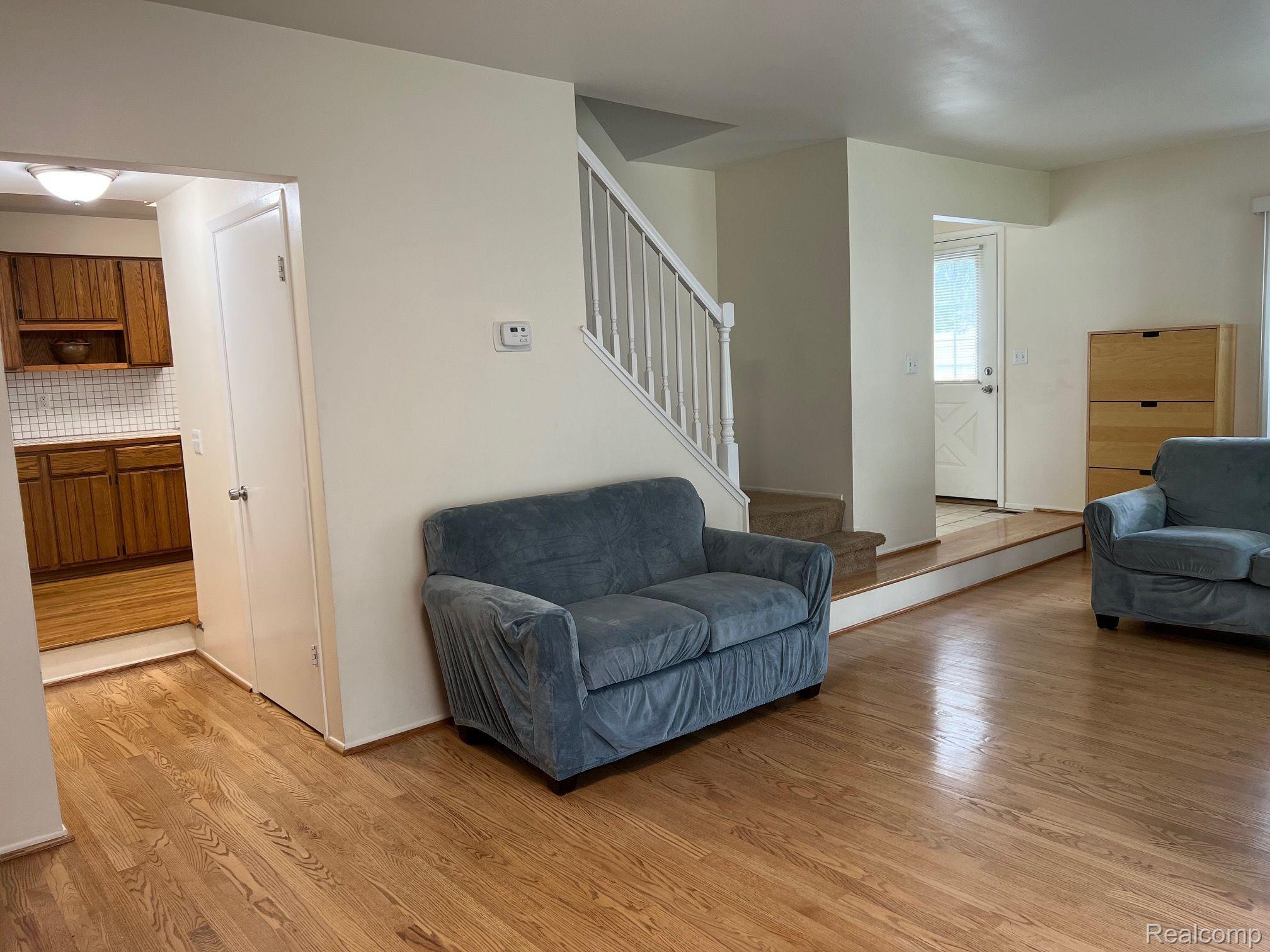 1185 Pine Ridge Court Rochester, MI 48306 - Photo 5 of 21 Living room. Nice floors!