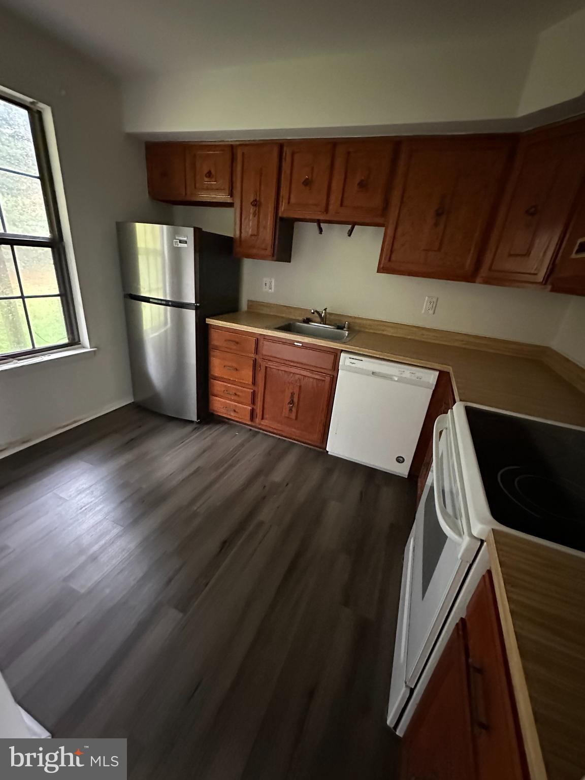 104 Willow Turn, Unit A Mount Laurel, NJ 08054 - Photo 2 of 8 a view of kitchen and wooden floor