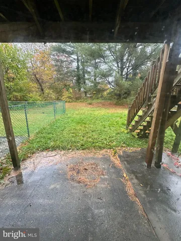 a view of a yard with an outdoor space