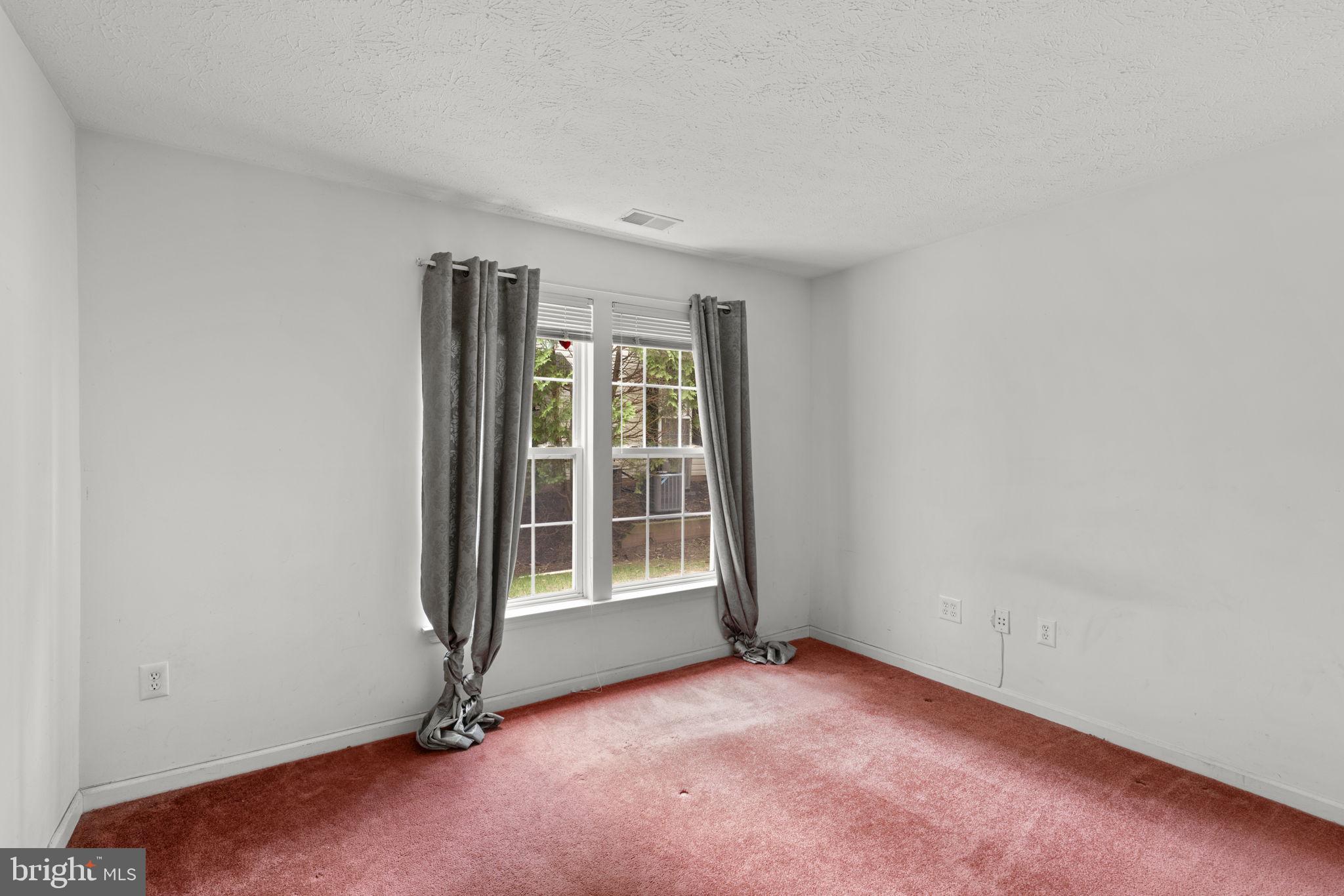 9713 Reese Farm Road, Unit 9713 Owings Mills, MD 21117 - Photo 14 of 30 an empty room with windows