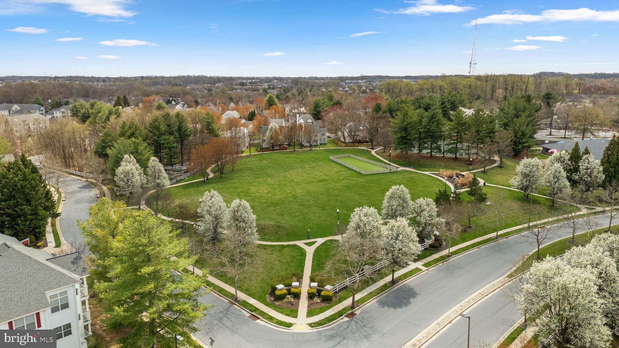 9713 Reese Farm Road, Unit 9713 Owings Mills, MD 21117 - Photo 28 of 30 a view of a lake from a balcony