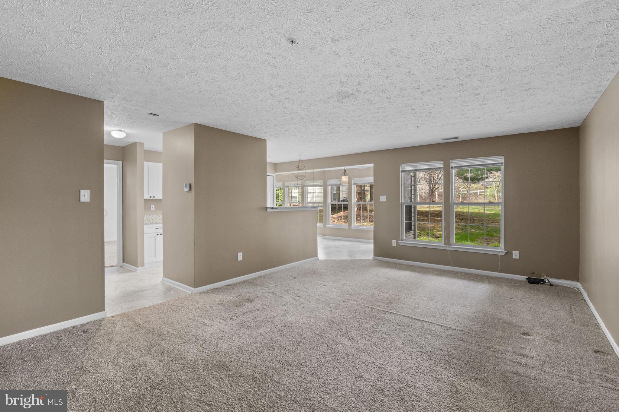 9713 Reese Farm Road, Unit 9713 Owings Mills, MD 21117 - Photo 4 of 30 a view of an empty room with a window