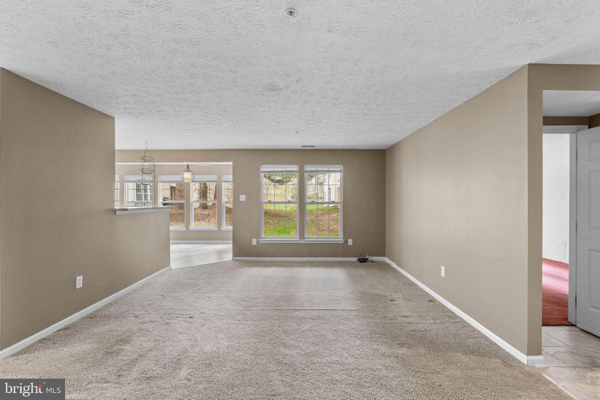 9713 Reese Farm Road, Unit 9713 Owings Mills, MD 21117 - Photo 5 of 30 a view of an empty room with a window