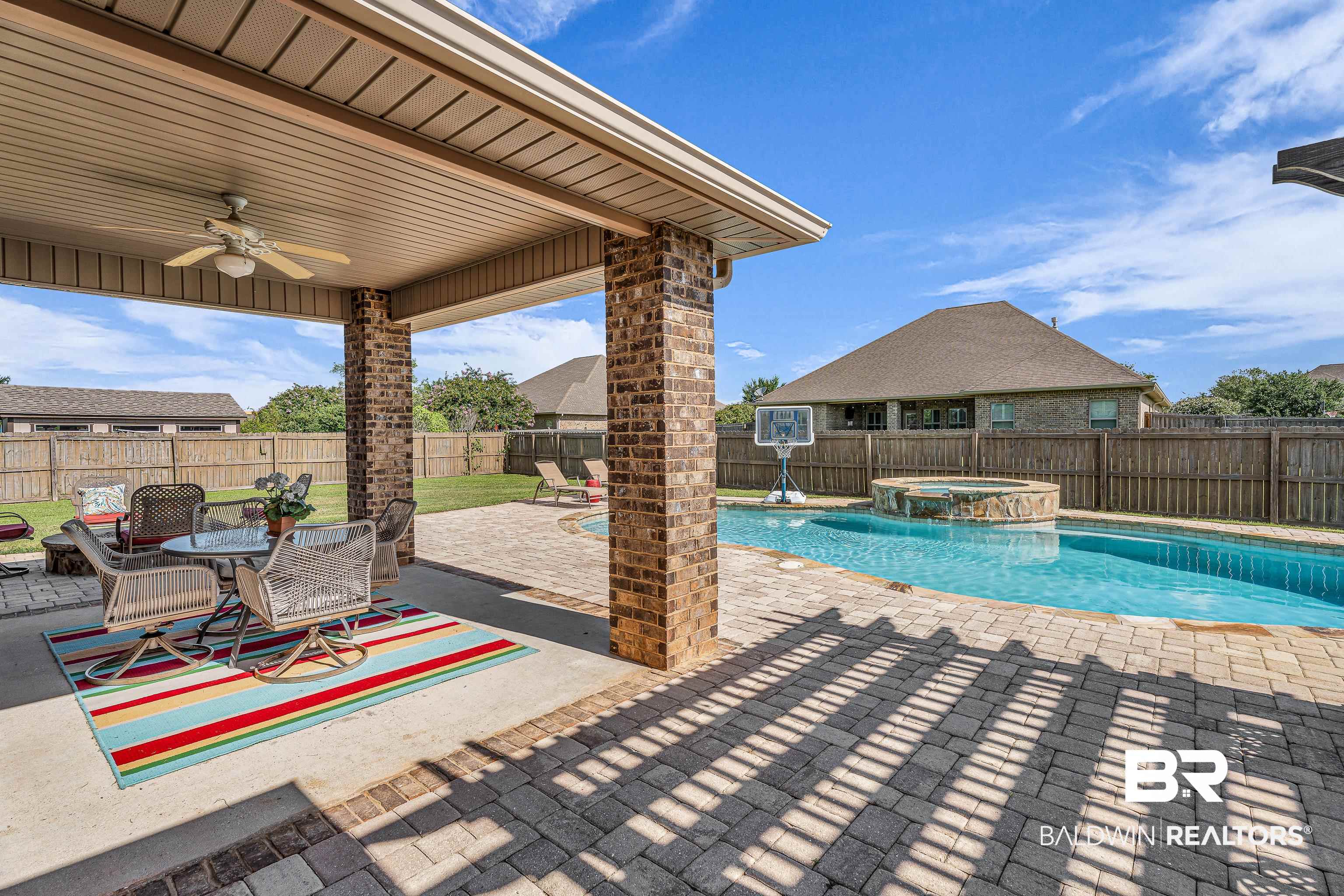 9675 Camberwell Drive Daphne, AL 36526 - Photo 24 of 34 View of pool with a fenced backyard, a pool with connected hot tub, ceiling fan, and a patio