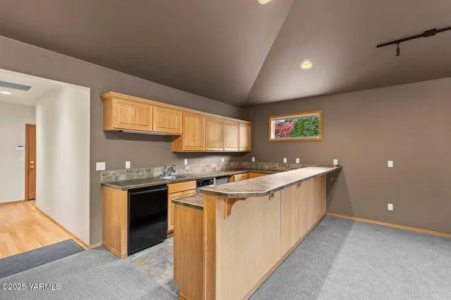 a kitchen with a stove top oven