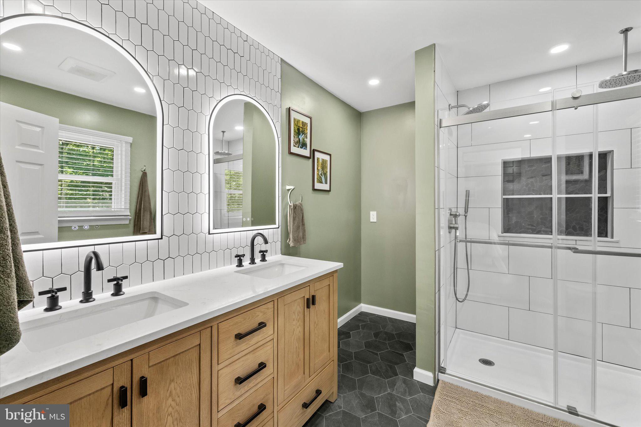 230 Richards Ferry Road Fredericksburg, VA 22406 - Photo 29 of 96 Elegant dual-sink bathroom retreat.